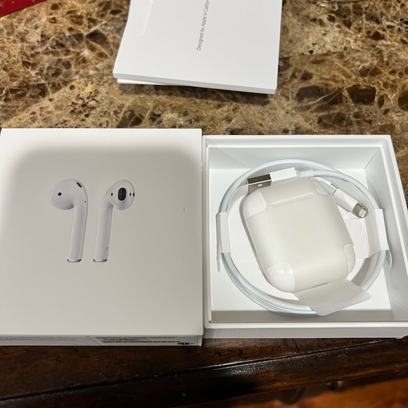 Apple AirPods in original packaging, perfect